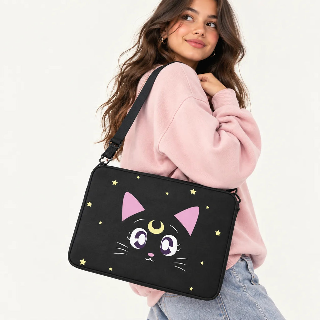 Cute Sailor Moon Luna black cat face with crescent moon and stars on a black padded laptop sleeve by SLEEVER