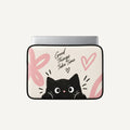 A laptop sleeve featuring a cute black cartoon cat peeking up from the bottom, with pink hearts and abstract pink shapes on a cream background. The text 'Good Things Take Time' is written in black script.