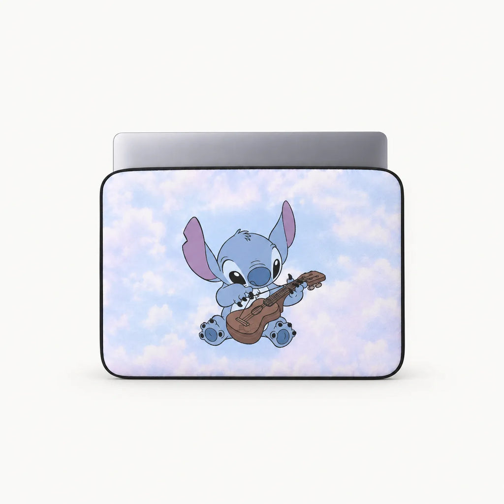 Cute Disney Stitch character playing ukulele on a fluffy pastel blue sky background on a padded laptop sleeve by SLEEVER