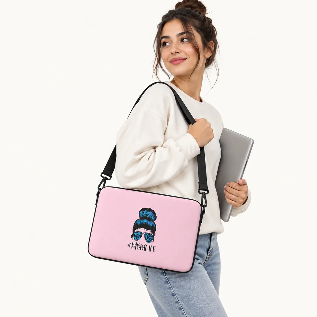 Messy hair bun illustration with blue leopard sunglasses and #MOMLIFE text on a soft pink padded laptop sleeve by SLEEVER