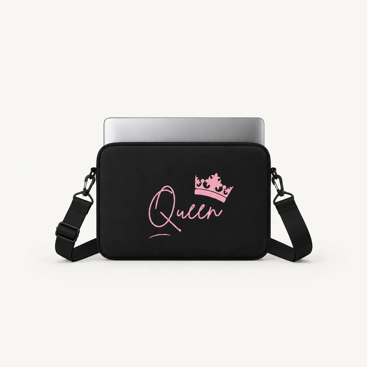 Pink Queen script calligraphy with royal crown graphic on solid black padded laptop sleeve by SLEEVER