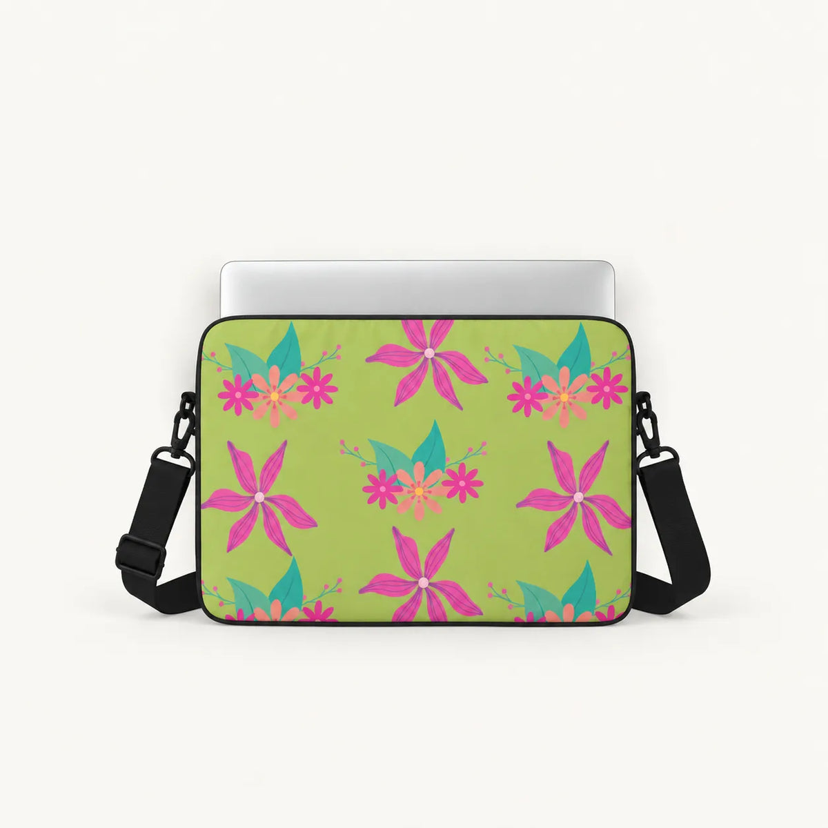 Bright pink tropical flowers and green leaves pattern on a light lime green padded laptop sleeve by SLEEVER