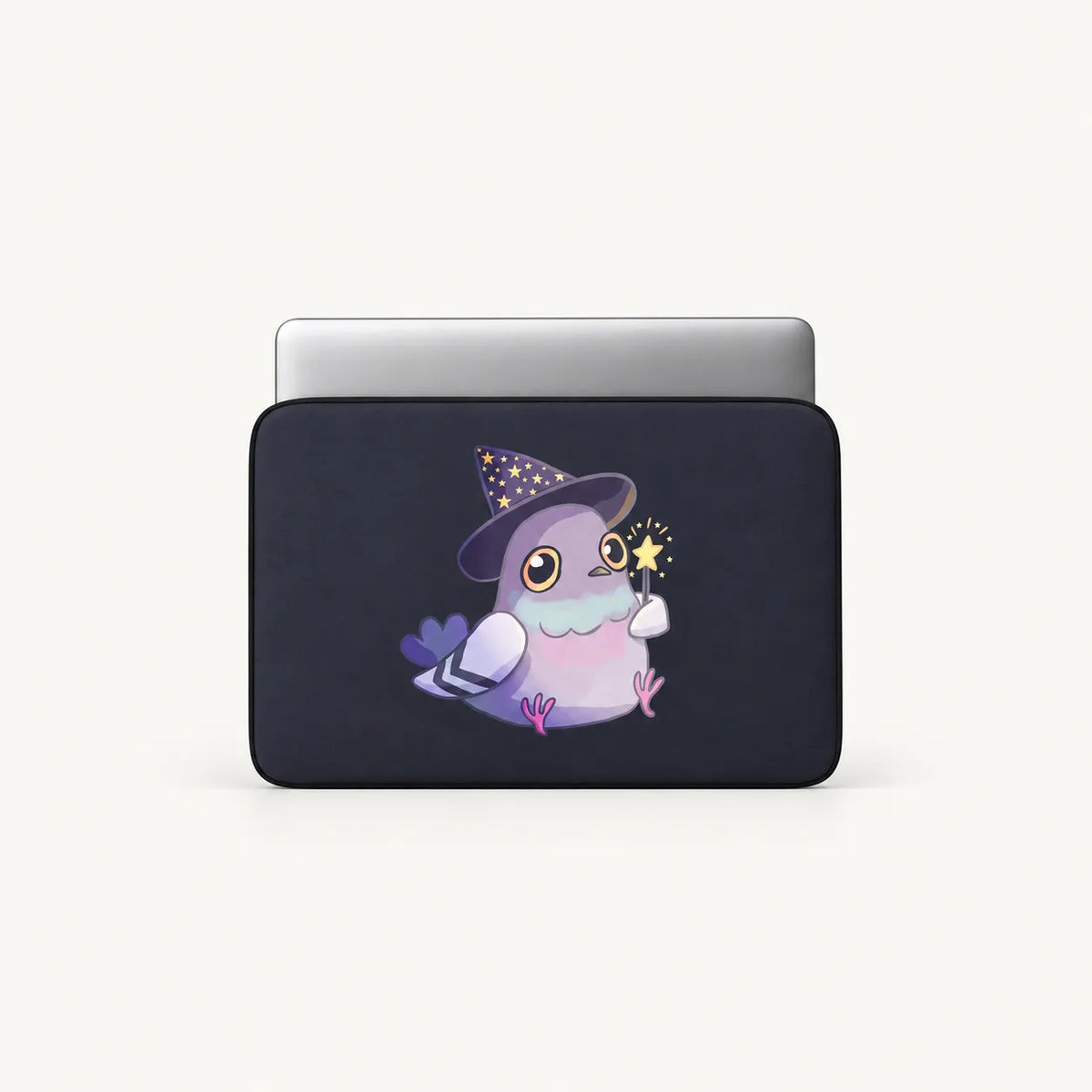 A dark navy laptop sleeve with a cute cartoon wizard pigeon graphic, shown on a light gray background.