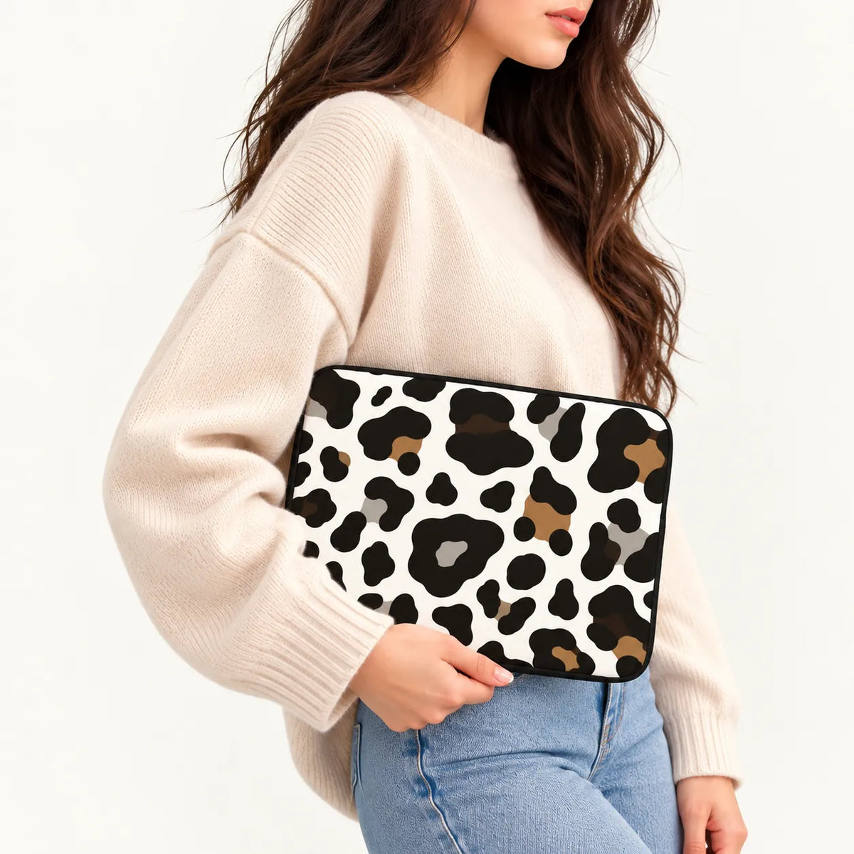 Stylish brown black and grey cheetah spot animal pattern on a padded laptop sleeve by SLEEVER