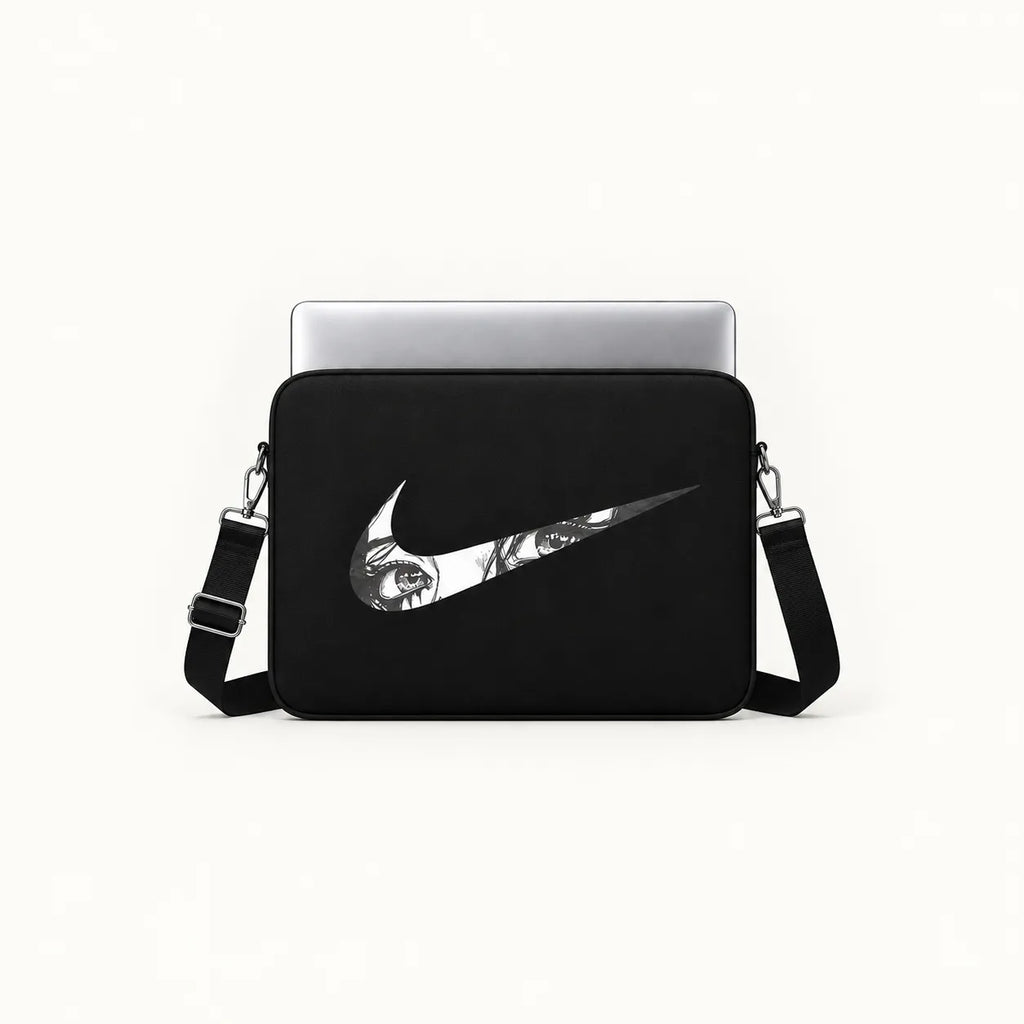 A black laptop sleeve with a large white Nike Swoosh featuring a skull and crossbones design, shown with a silver laptop on a plain white background.