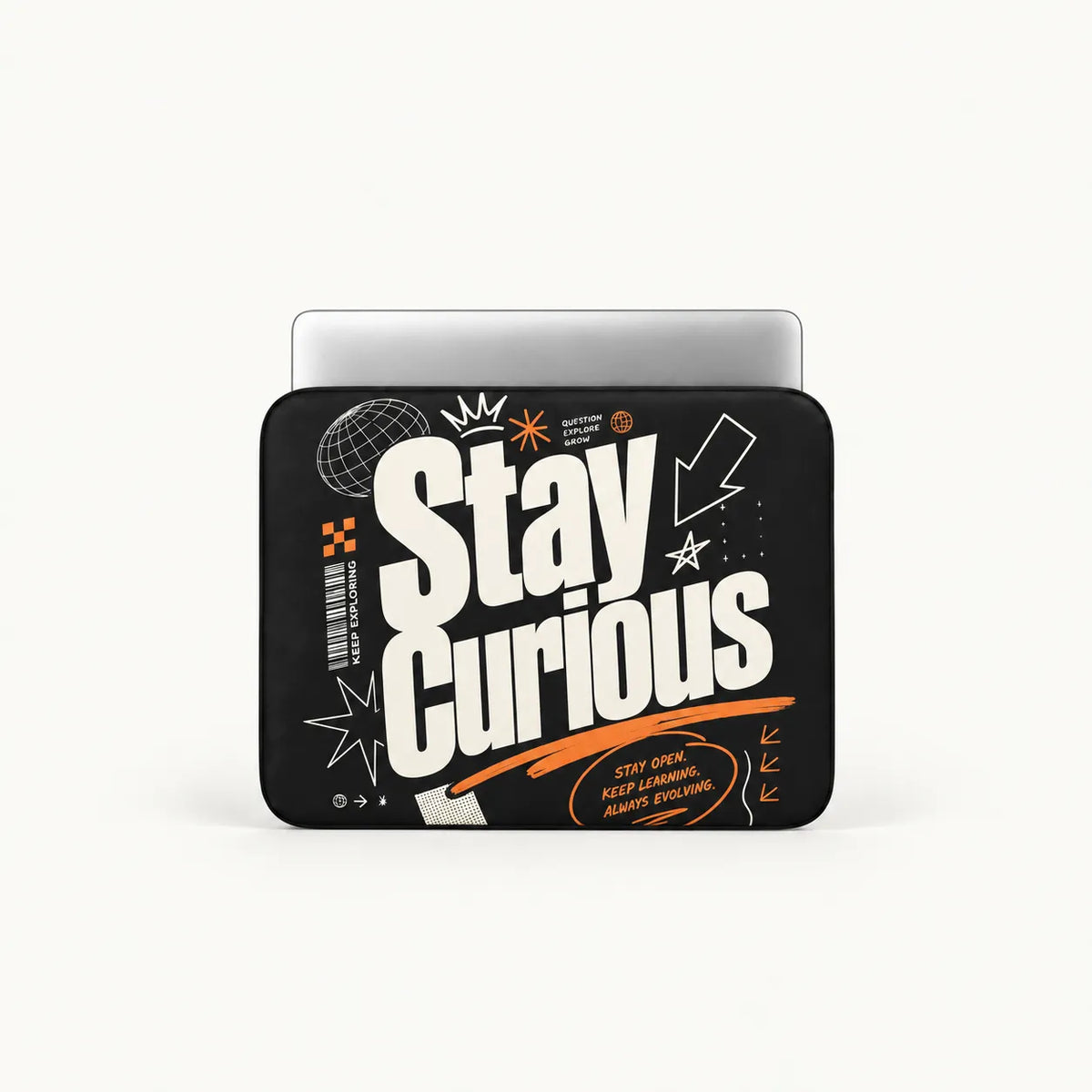A black laptop sleeve featuring a bold graphic design with the words 'Stay Curious' in large white letters, accompanied by white stars, an arrow, and orange accents, shown on a light gray background.