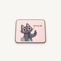 A square mousepad with rounded corners featuring a cartoon gray cat wearing glasses and a blue tie, holding a laptop and giving a thumbs-up, with the text 'I love my job.