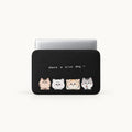 Four cute cartoon cats with Have a nice day typography on a black padded laptop sleeve by SLEEVER
