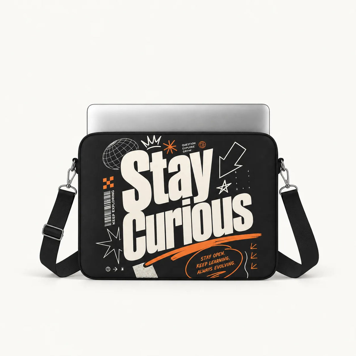 Urban streetwear style padded laptop sleeve in black with Stay Curious typography and orange graphic elements by SLEEVER