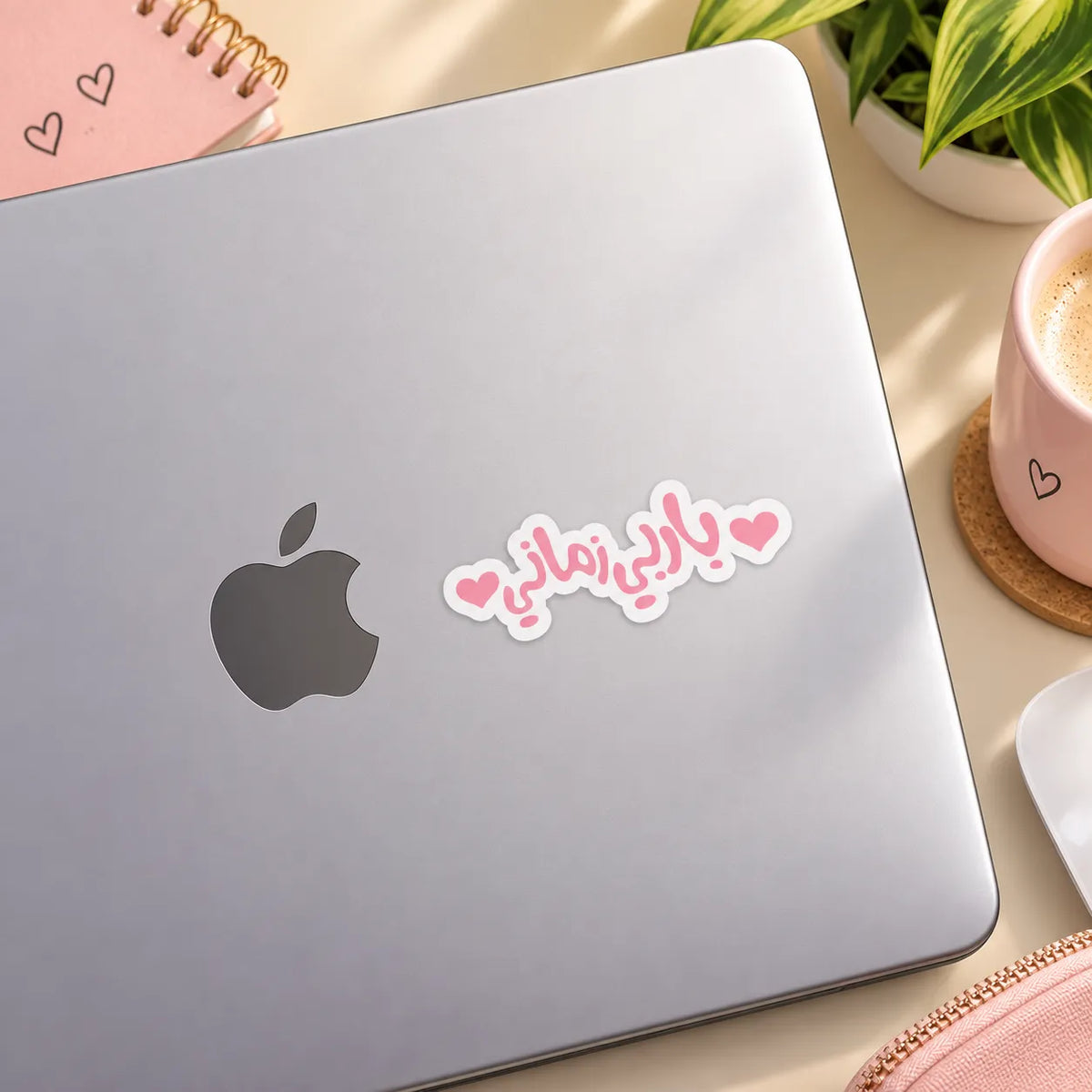 Pink Arabic calligraphy sticker saying Barbie Zamani flanked by two pink hearts by SLEEVER   