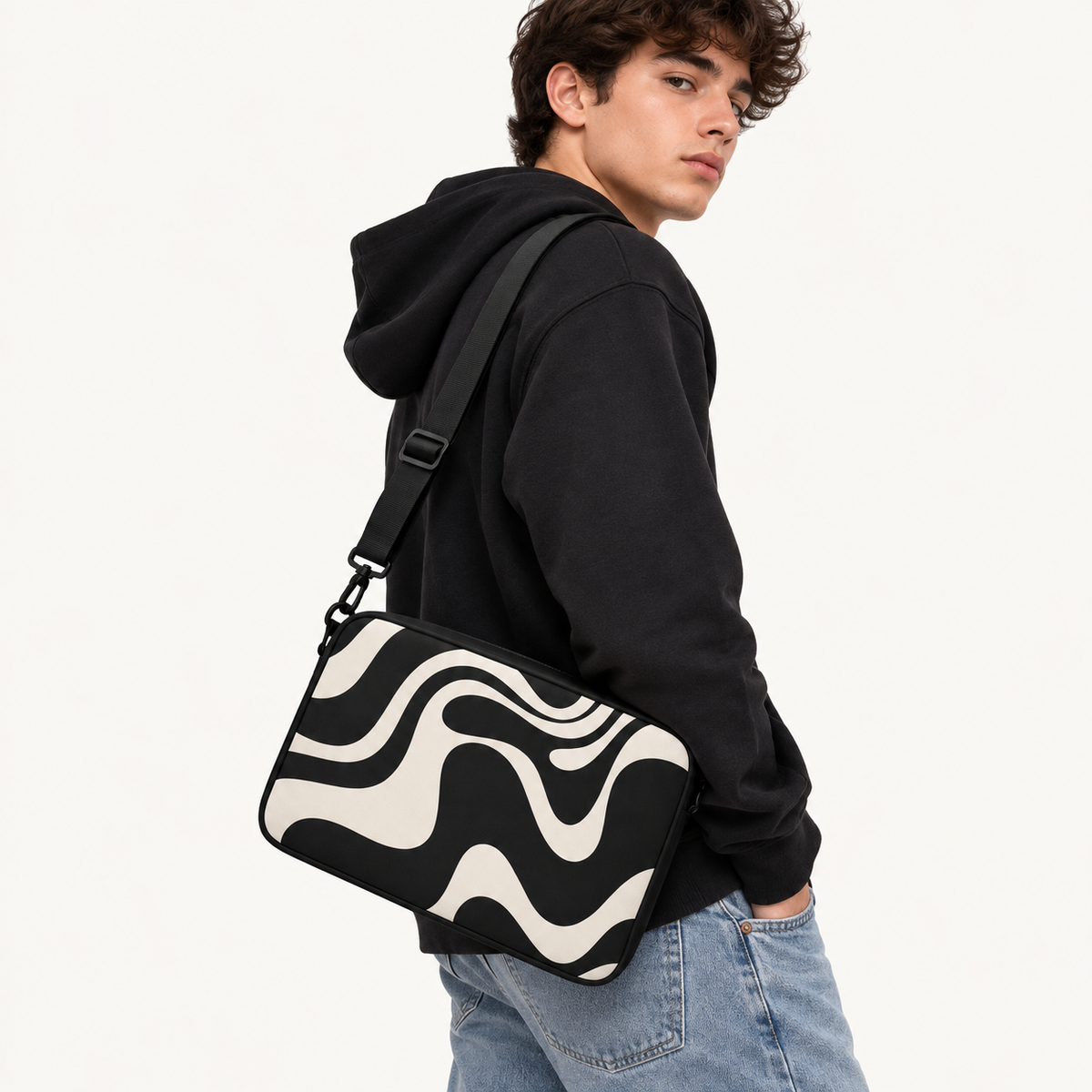 Monochrome abstract wavy swirl fluid line pattern on black and cream padded laptop sleeve by SLEEVER