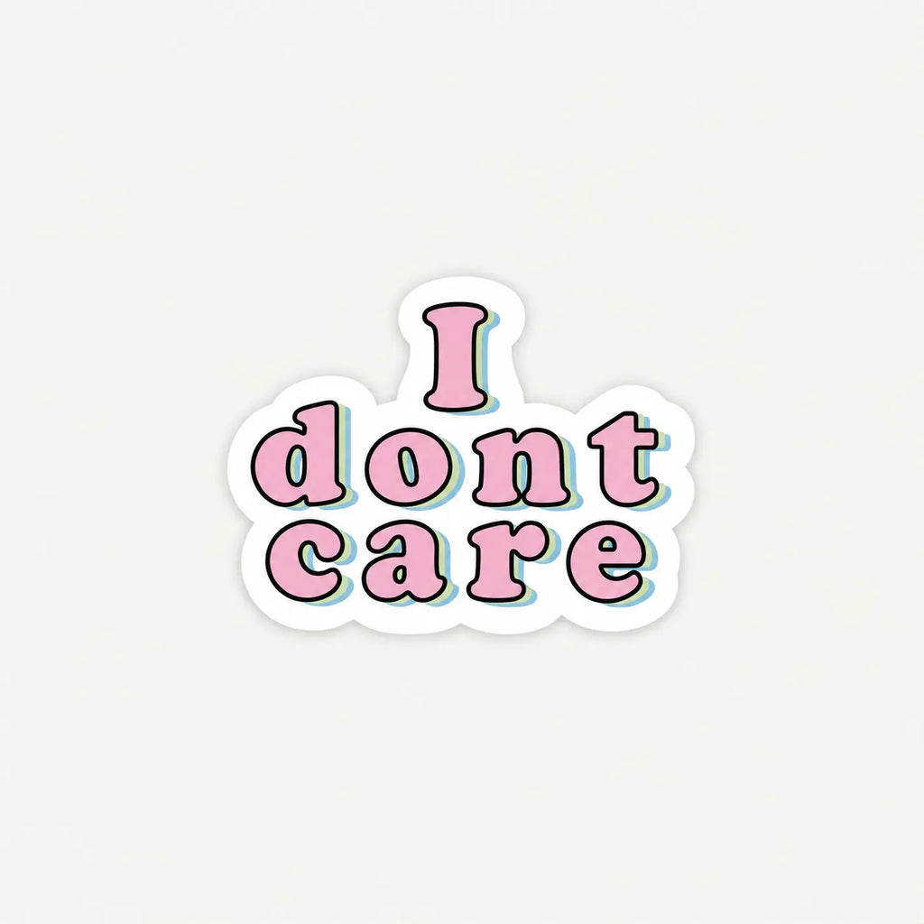 A die-cut sticker with the phrase 'I dont care' in pink bubble letters outlined in black, with a white border and a subtle light blue shadow, centered on a light gray background.