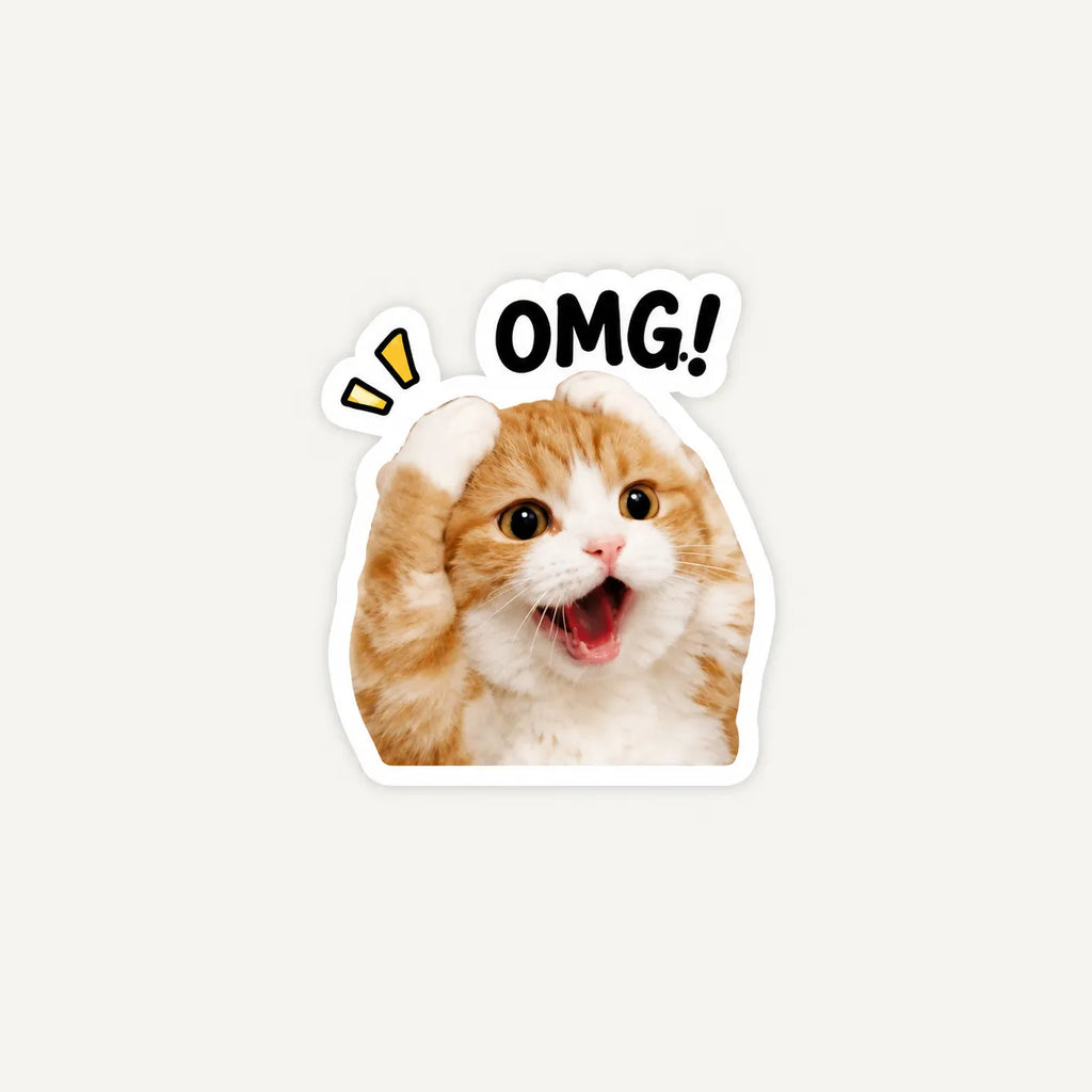 A die-cut sticker featuring a close-up photo of an orange and white cat with its mouth open, above the text 'OMG!' in black with a white outline. The sticker is shown on a plain light gray background.