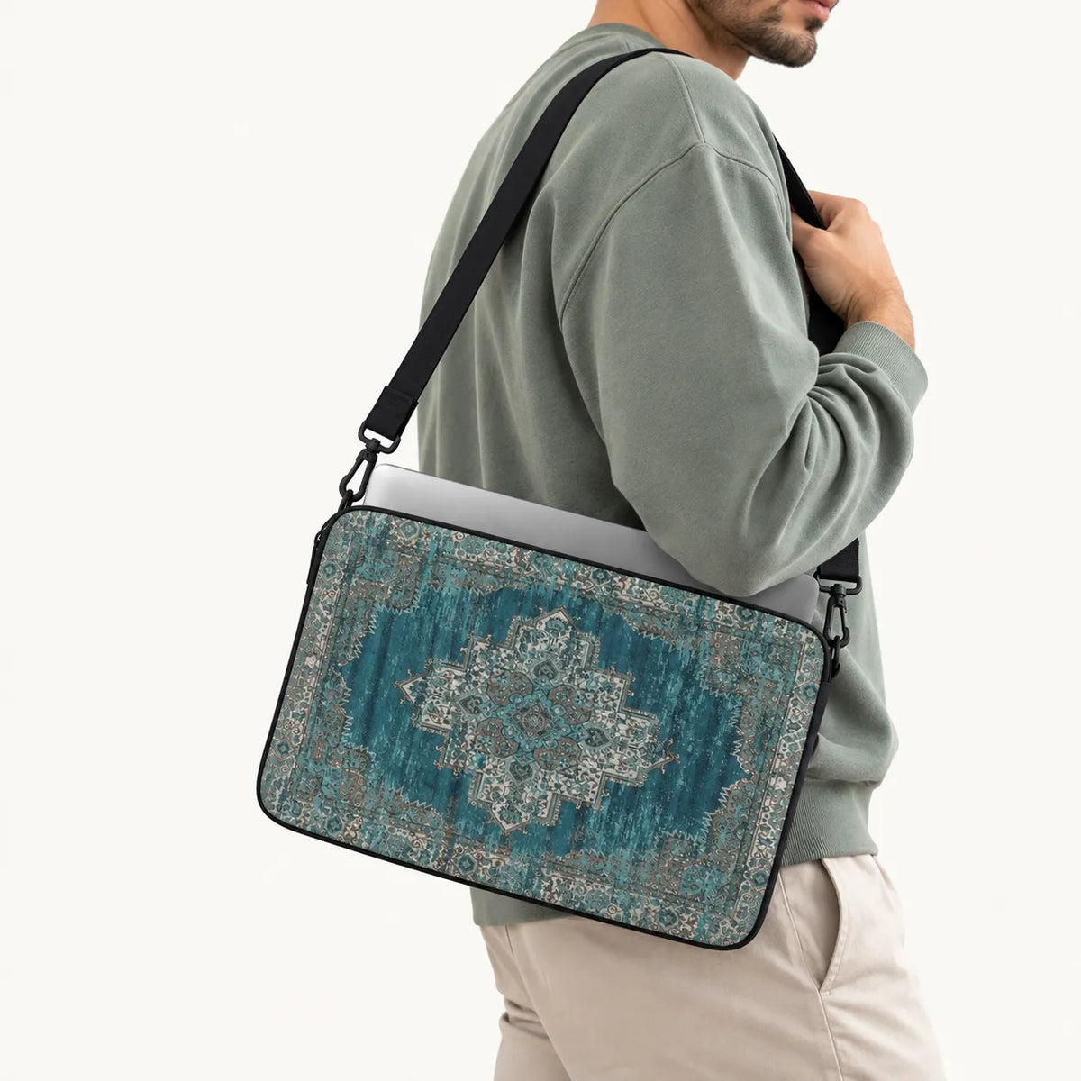 Vintage oriental Persian carpet rug pattern in teal and beige on a padded laptop sleeve by SLEEVER