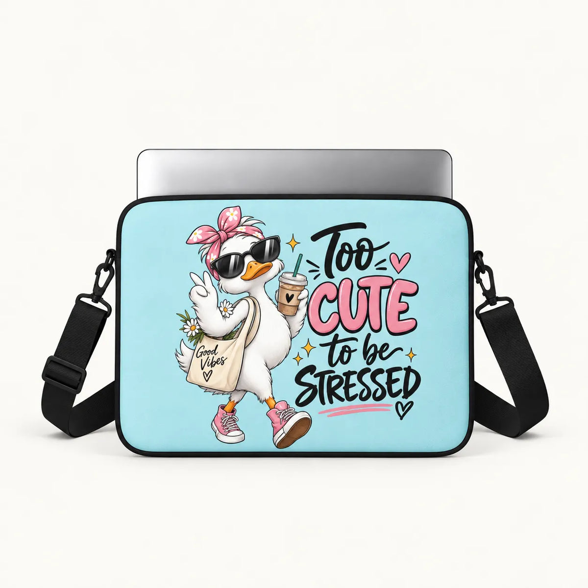 A light blue laptop sleeve featuring a cartoon white duck character wearing sunglasses and a pink bow, holding a coffee cup and a tote bag that says 'Good Vibes Only'. The text 'Too CUTE to be STRESSED' is printed on the front in pink and black.