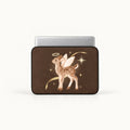 A laptop sleeve with a brown background featuring a cute angel deer illustration, shown on a silver laptop against a clean white background.