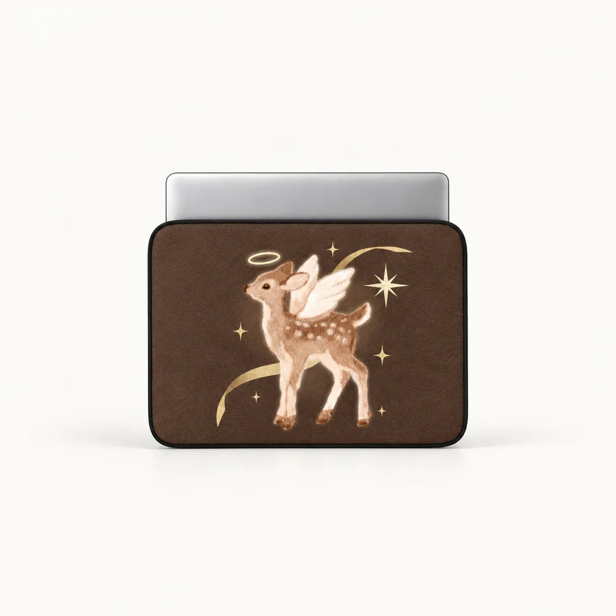 A laptop sleeve with a brown background featuring a cute angel deer illustration, shown on a silver laptop against a clean white background.