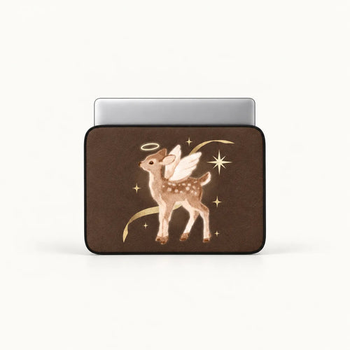 A laptop sleeve with a brown background featuring a cute angel deer illustration, shown on a silver laptop against a clean white background.