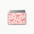 SLEEVER pink padded laptop sleeve with bow and heart pattern for 12–17 inch laptops
