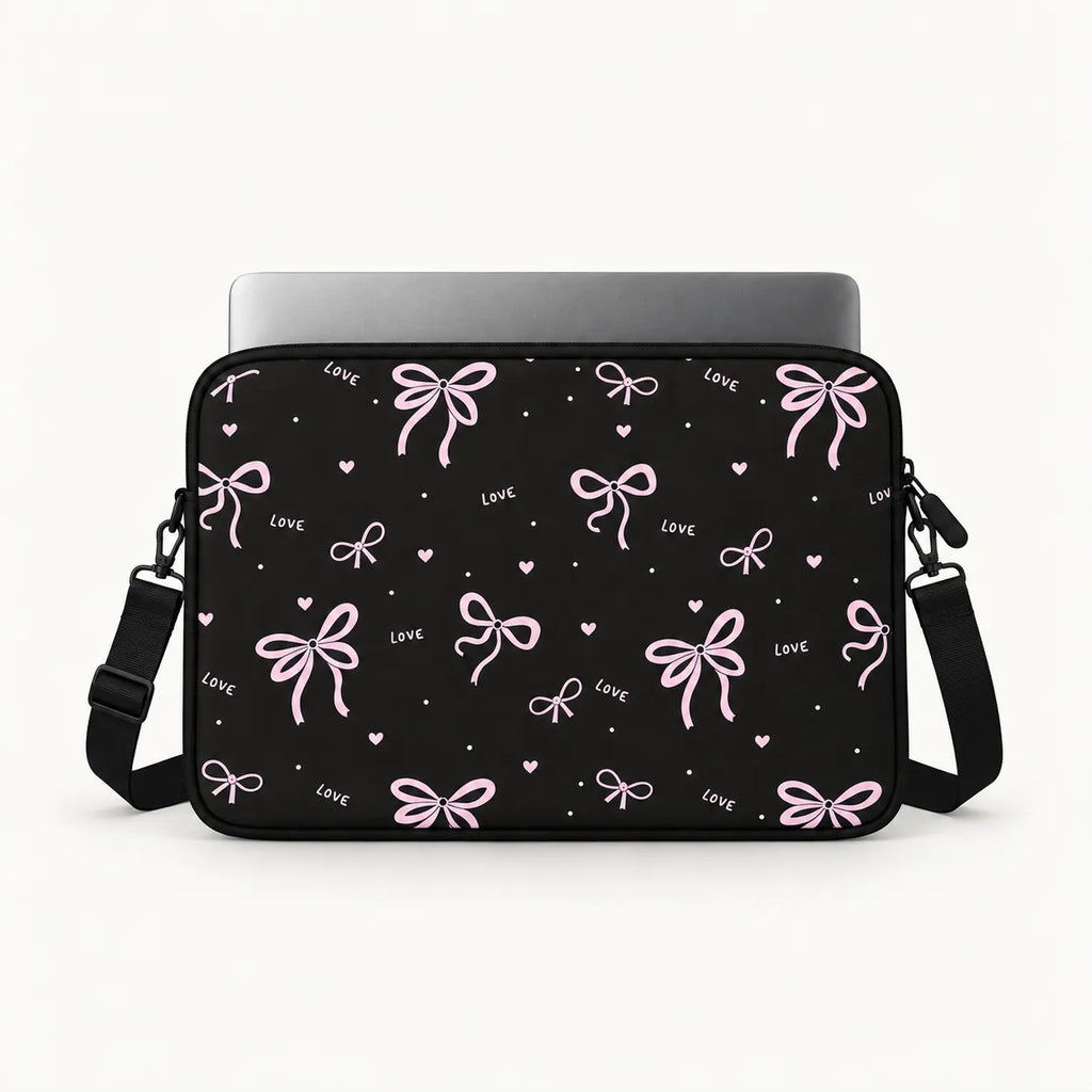 Pink ribbons bows and tiny hearts pattern printed on black padded laptop sleeve by SLEEVER