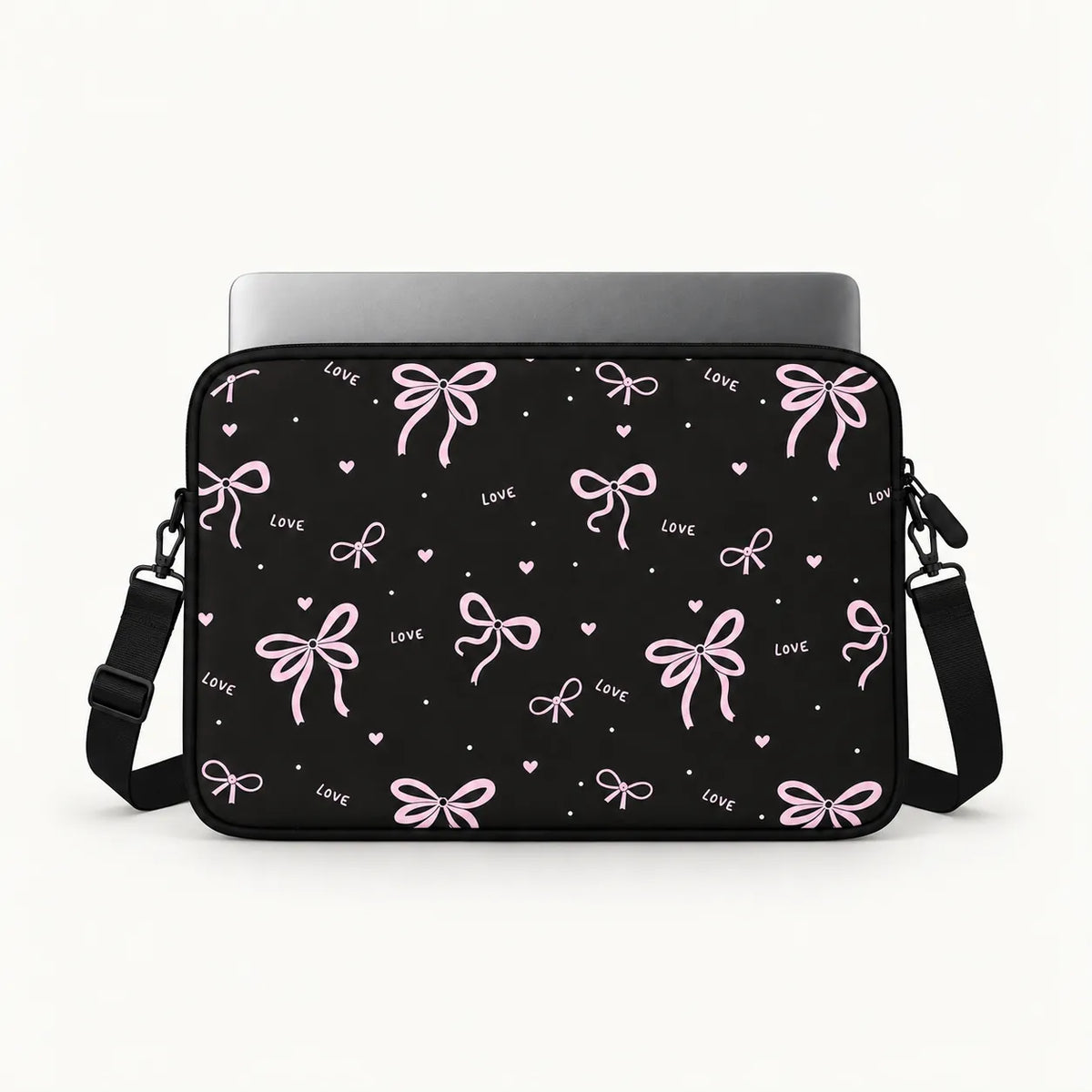 Pink ribbons bows and tiny hearts pattern printed on black padded laptop sleeve by SLEEVER