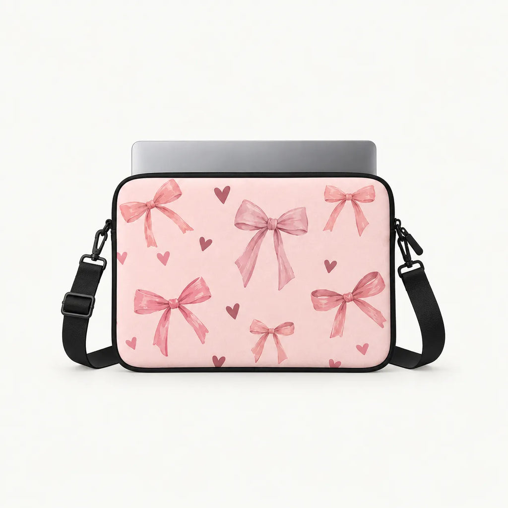 SLEEVER pink padded laptop sleeve with bow and heart pattern for 12–17 inch laptops
