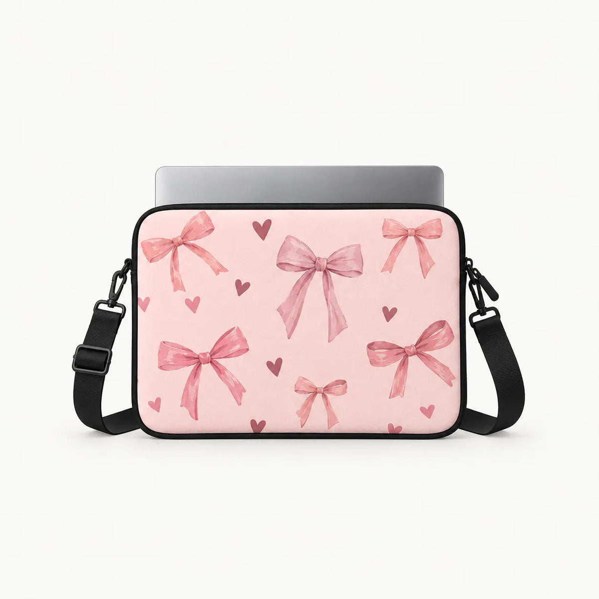 SLEEVER pink padded laptop sleeve with bow and heart pattern for 12–17 inch laptops
