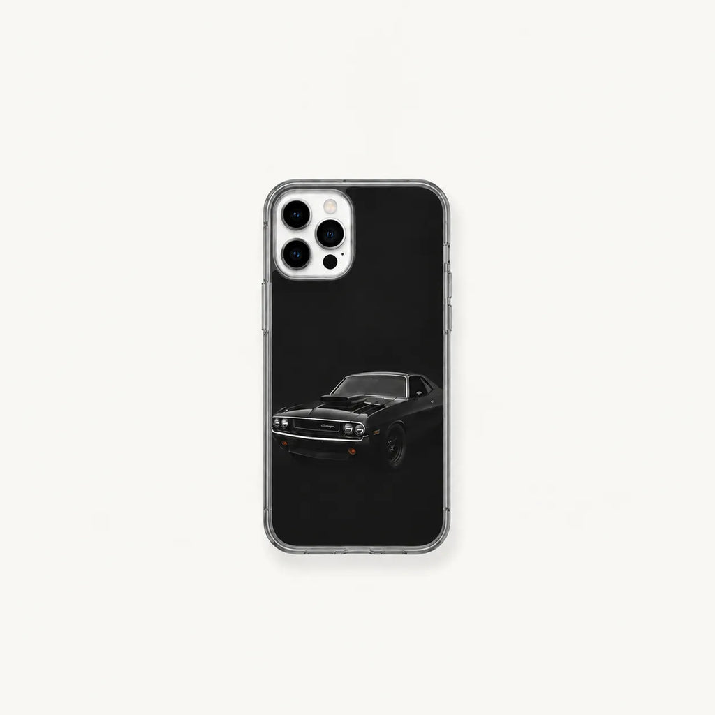 SLEEVER clear TPU phone case featuring a classic black Dodge Challenger muscle car UV print with magnetic charging support