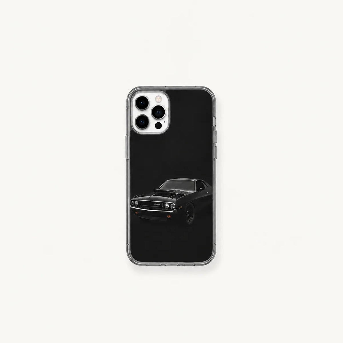 SLEEVER clear TPU phone case featuring a classic black Dodge Challenger muscle car UV print with magnetic charging support