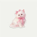 SLEEVER luxury die-cut vinyl sticker featuring an aesthetic fluffy white kitten with a pink ribbon bow on a minimalist grey background