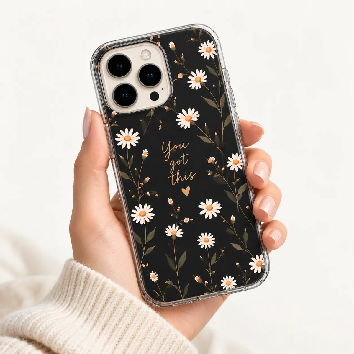 SLEEVER clear TPU phone case with white daisies pattern and "You Got This" typography on black background UV print with magnetic charging compatibility