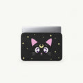 Cute Sailor Moon Luna black cat face with crescent moon and stars on a black padded laptop sleeve by SLEEVER