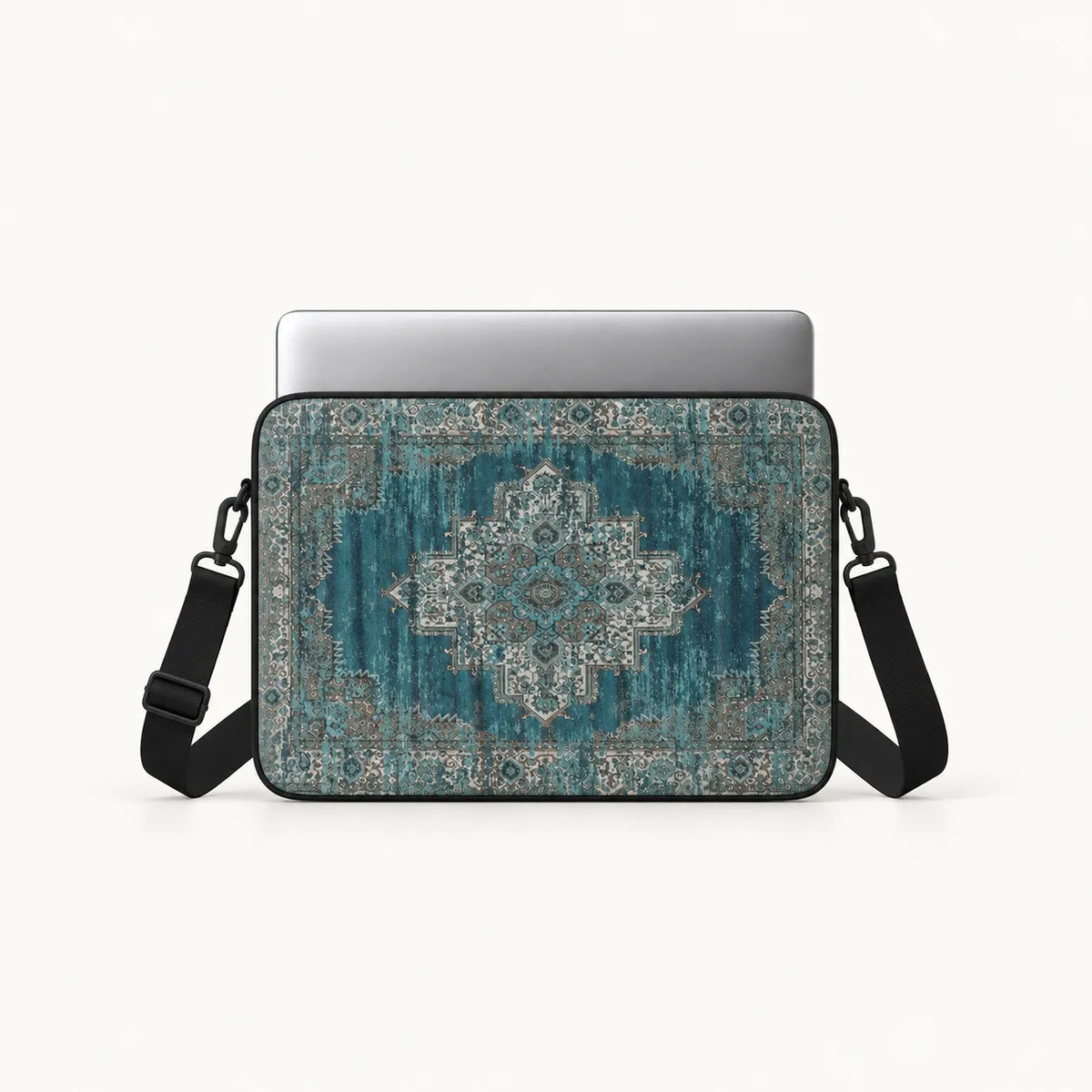 Vintage oriental Persian carpet rug pattern in teal and beige on a padded laptop sleeve by SLEEVER