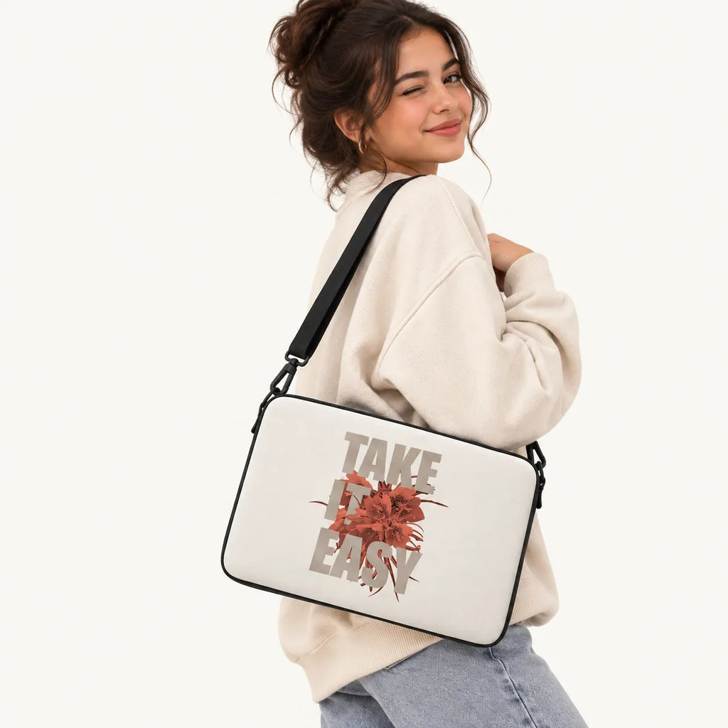 Take It Easy quote with red floral print beige padded laptop sleeve in sizes 12 to 17 inch by SLEEVER