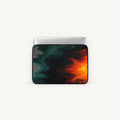 Dynamic fiery orange and red lava waves blended with dark teal abstract smoky textures on a padded laptop sleeve by SLEEVER