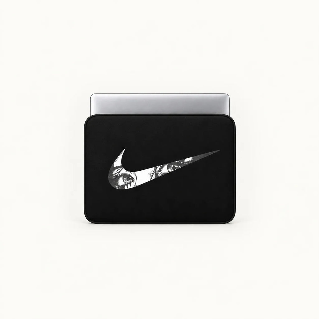 A black laptop sleeve featuring a stylized white Nike Swoosh with a detailed portrait design inside the swoosh, shown on a light gray background.