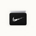 A black laptop sleeve featuring a stylized white Nike Swoosh with a detailed portrait design inside the swoosh, shown on a light gray background.