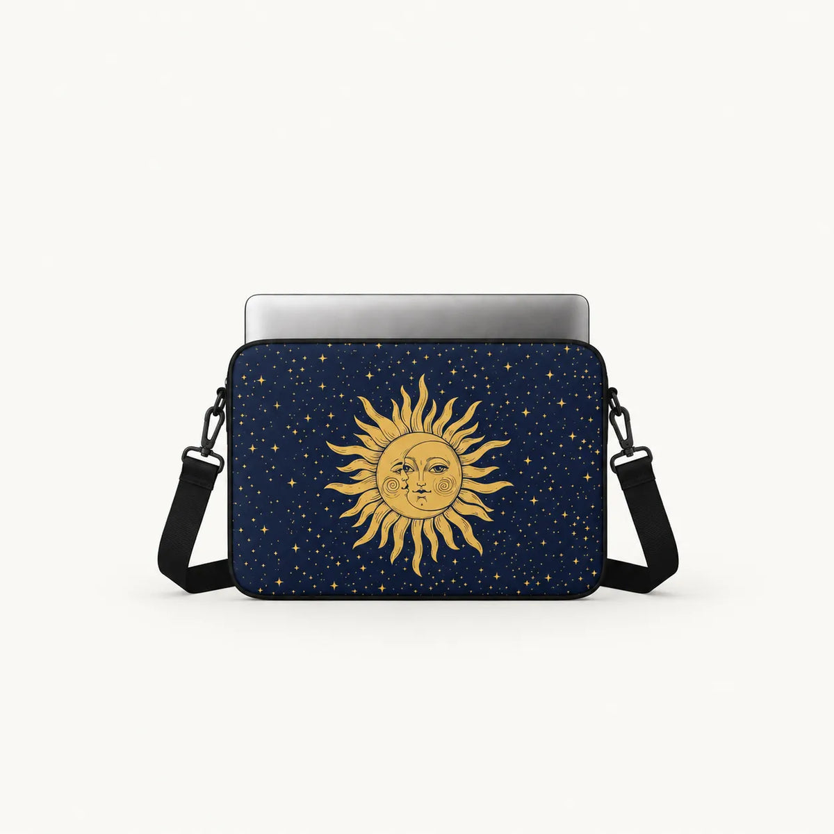 Vintage golden celestial sun and crescent moon design surrounded by stars on a dark navy blue padded laptop sleeve by SLEEVER