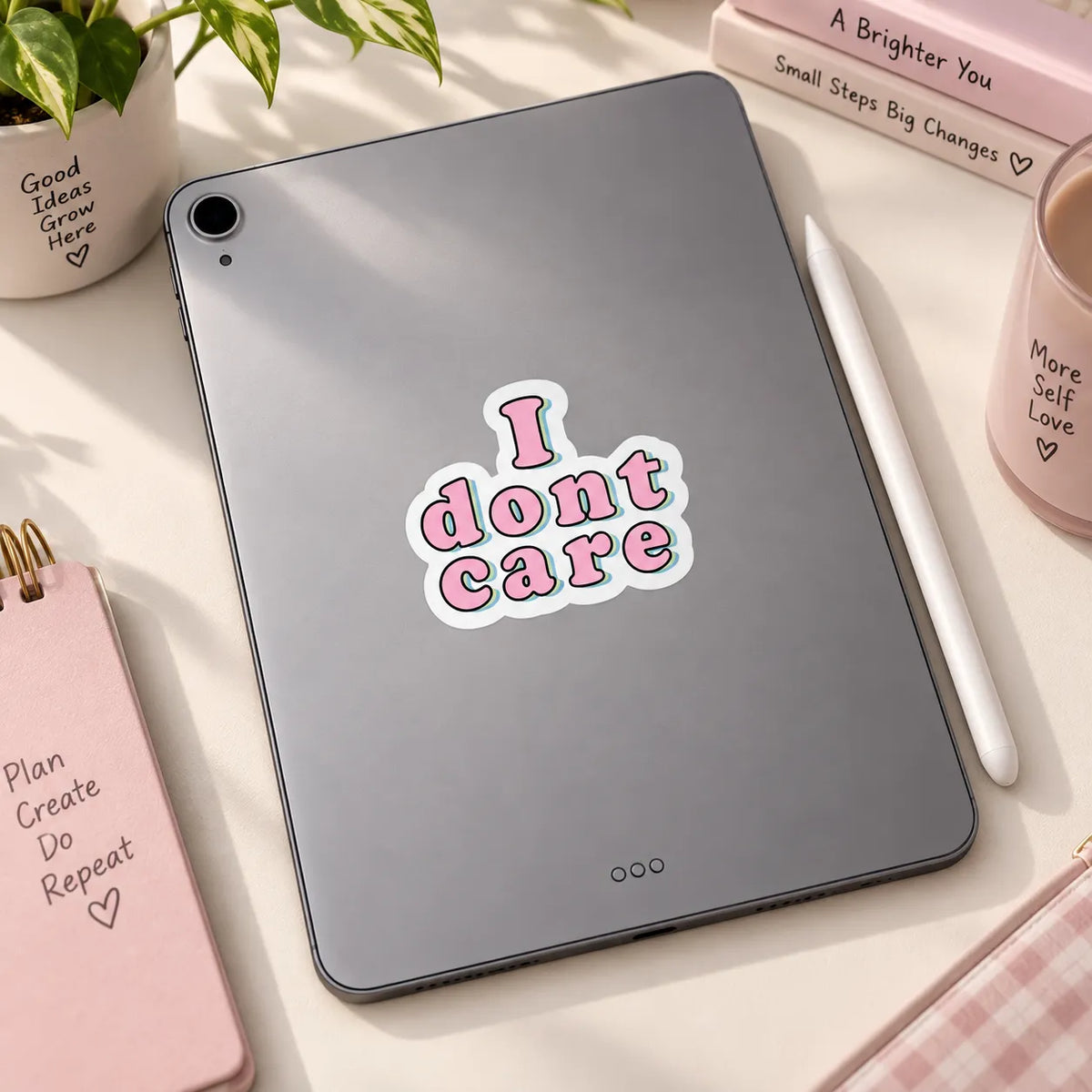Pink retro text I Don't Care sticker with pastel blue shadow by SLEEVER   