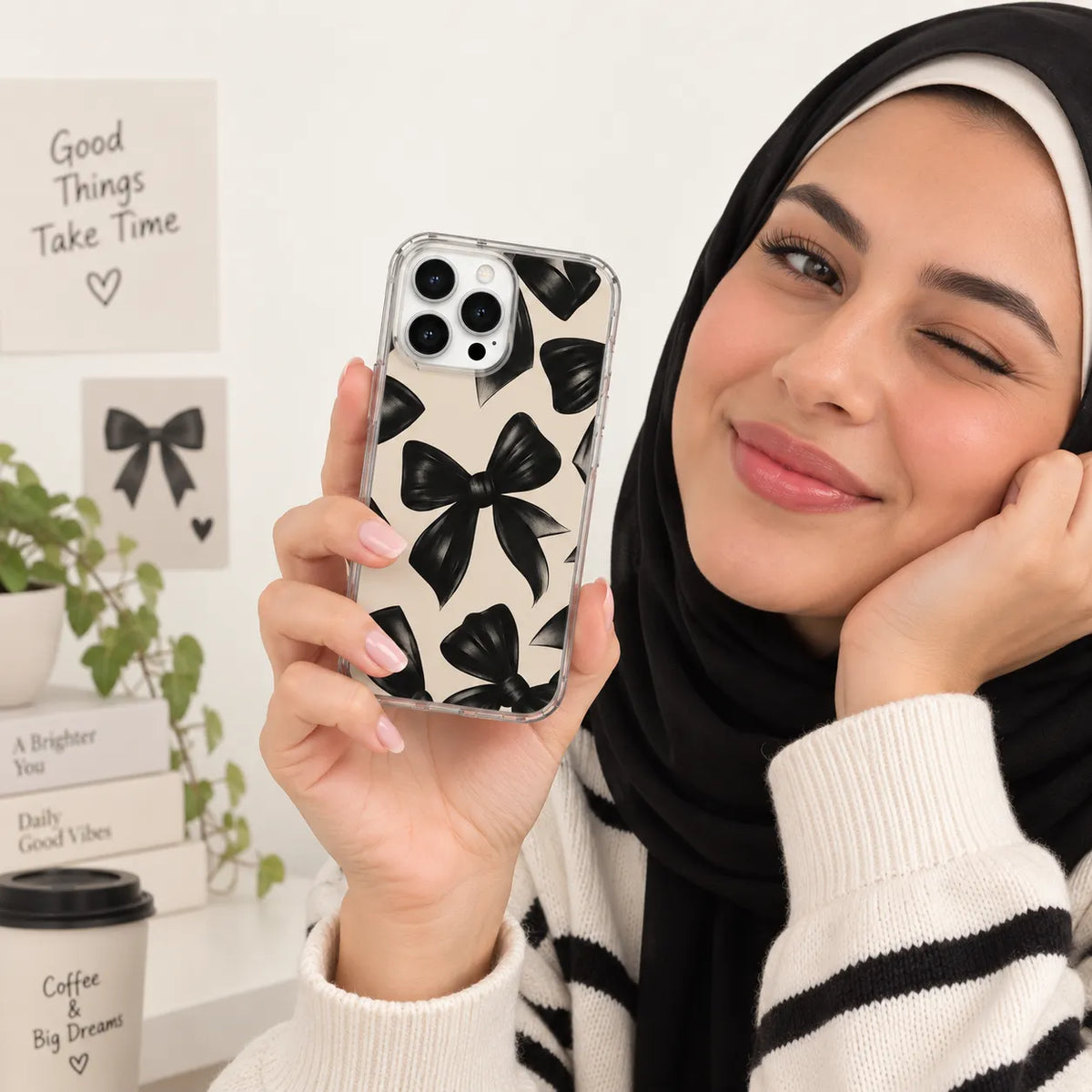 SLEEVER clear TPU phone case with elegant black ribbon bow pattern UV print and magnetic charging compatibility   
