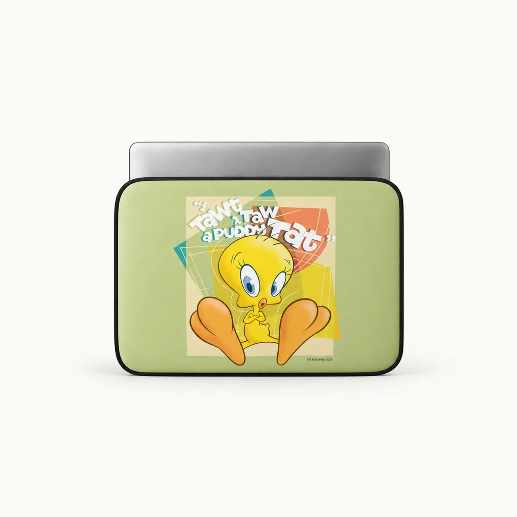 A laptop sleeve featuring a retro-style Tweety Bird graphic on a light green background, shown with a silver laptop partially inserted against a clean white studio background.