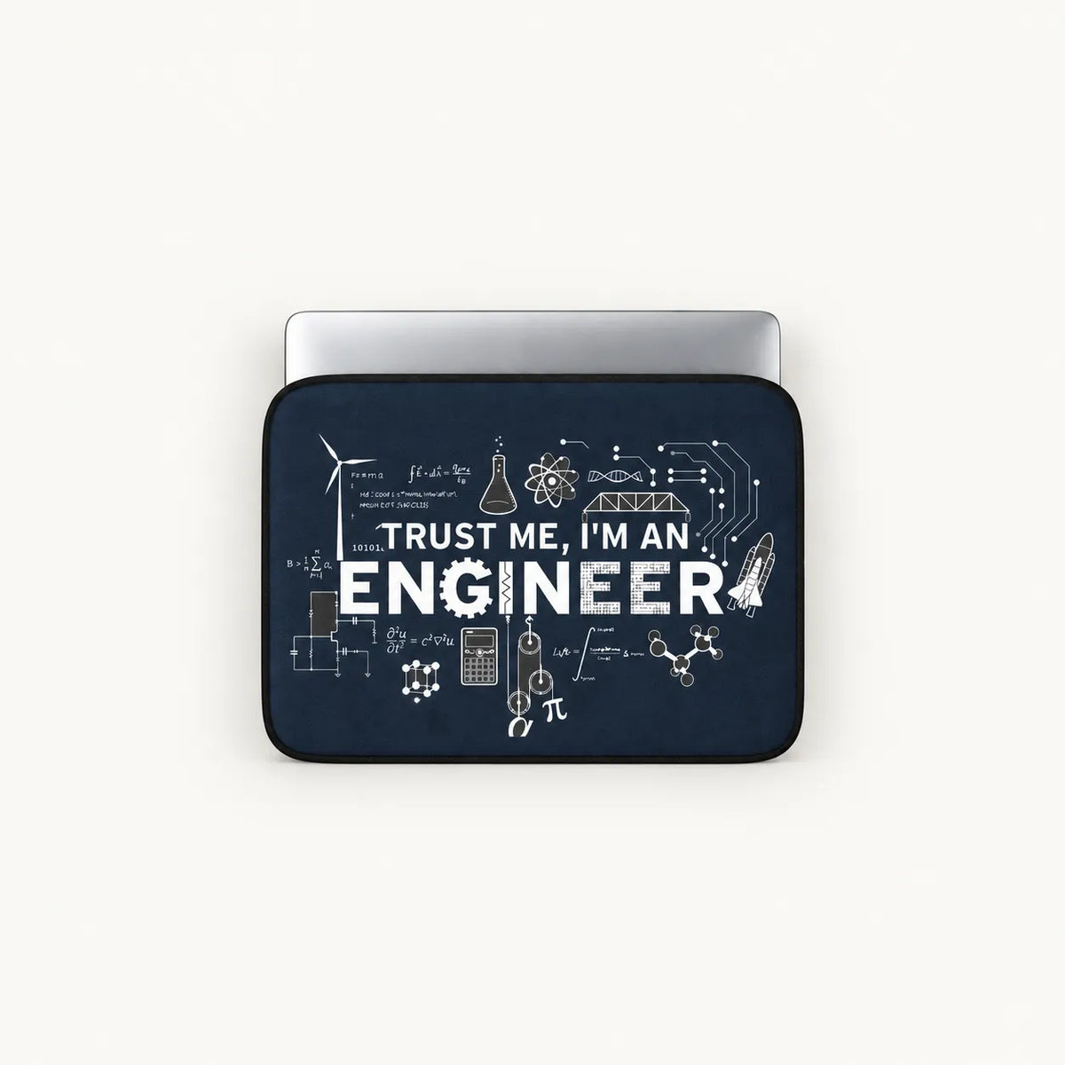 White "TRUST ME, I'M AN ENGINEER" text surrounded by scientific formulas, equations, circuit diagrams, and gear icons on a navy blue padded laptop sleeve by SLEEVER   