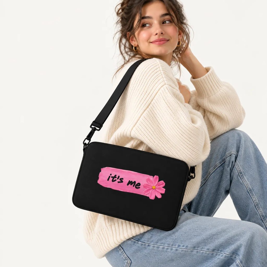 Pink paint stroke with a pink flower and it's me text on a black padded laptop sleeve by SLEEVER