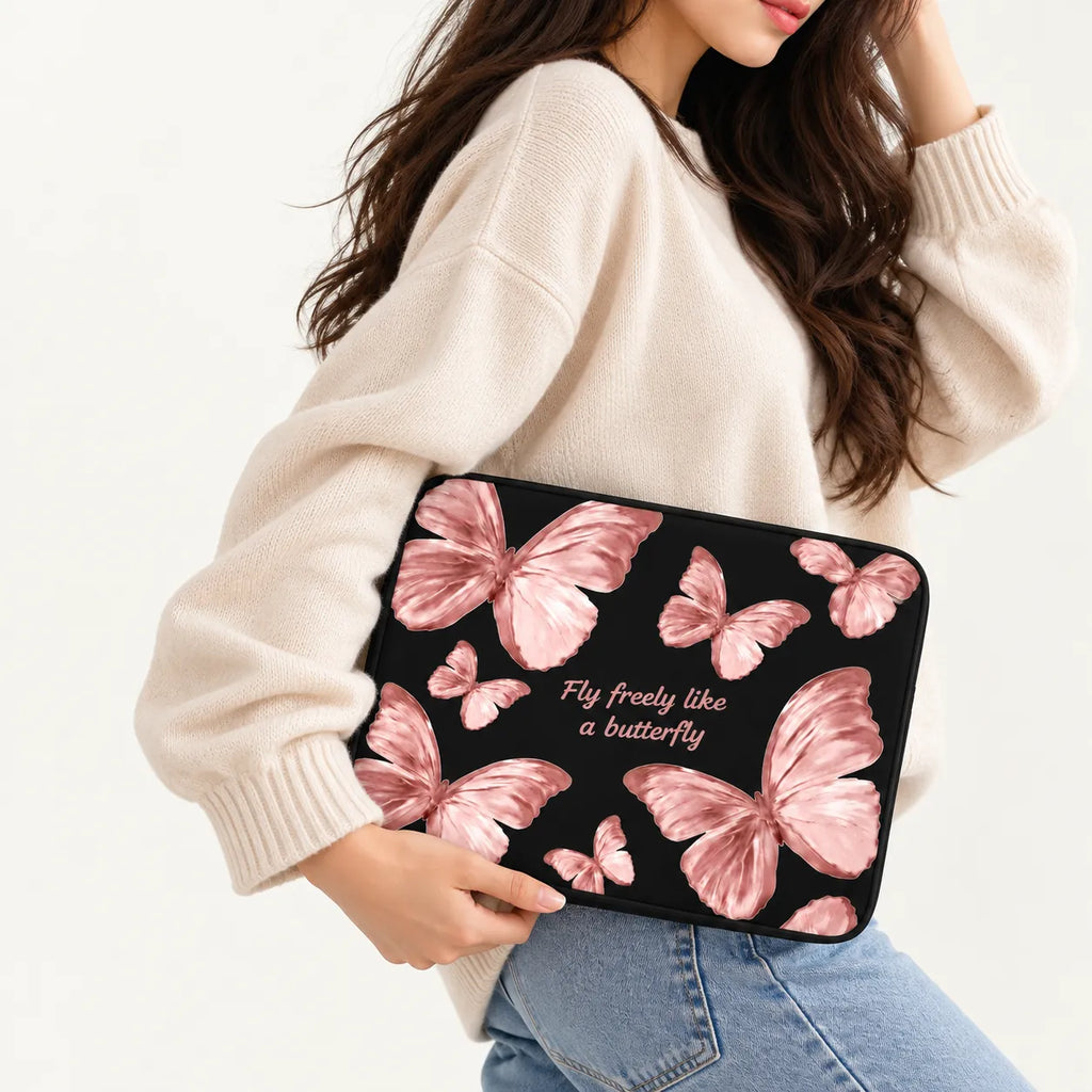 Rose gold pink butterflies artwork with quote Fly freely like a butterfly on a black padded laptop sleeve by SLEEVER