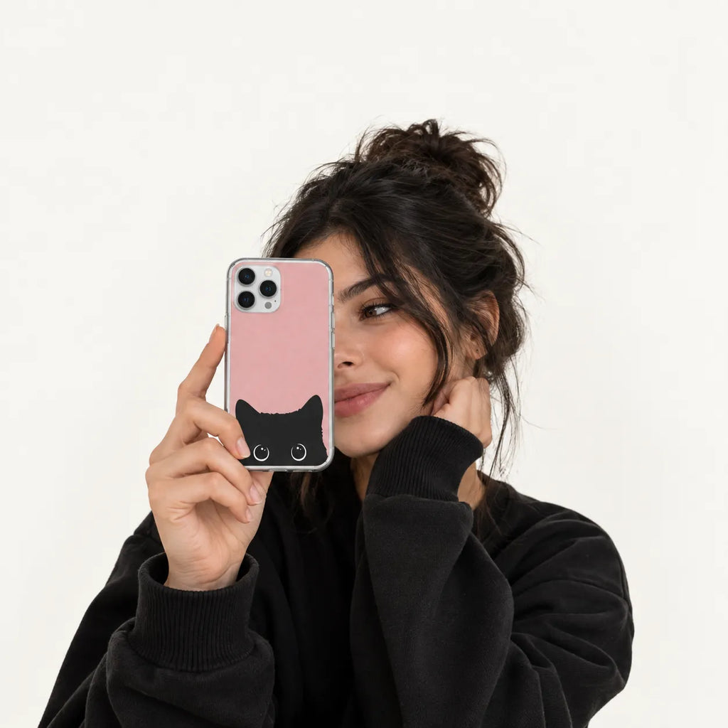 SLEEVER clear TPU phone case with cute peeking black cat graphic on pink background UV print and magnetic charging compatibility   