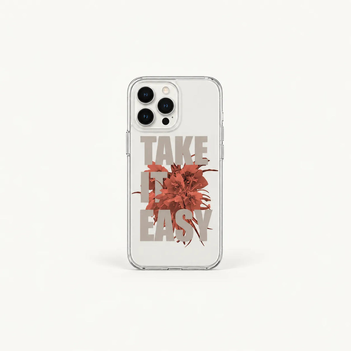A clear phone case featuring a graphic design with the words 'TAKE IT EASY' in a muted taupe font and a central rust-red abstract floral burst, shown on a light gray background.