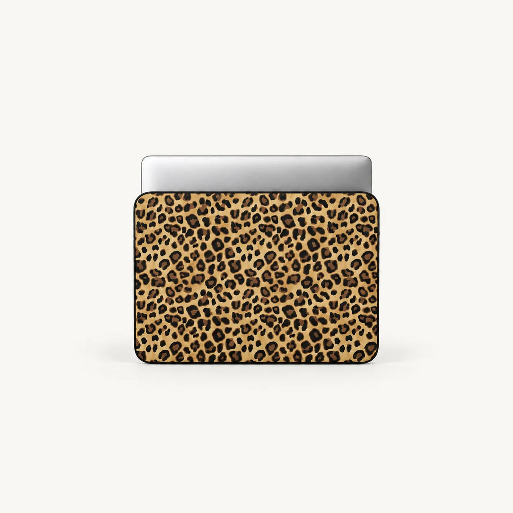 Classic leopard print pattern in gold and brown on a padded laptop sleeve by SLEEVER