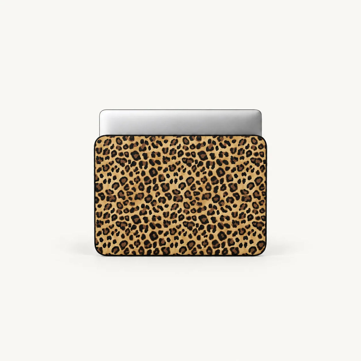 Classic leopard print pattern in gold and brown on a padded laptop sleeve by SLEEVER