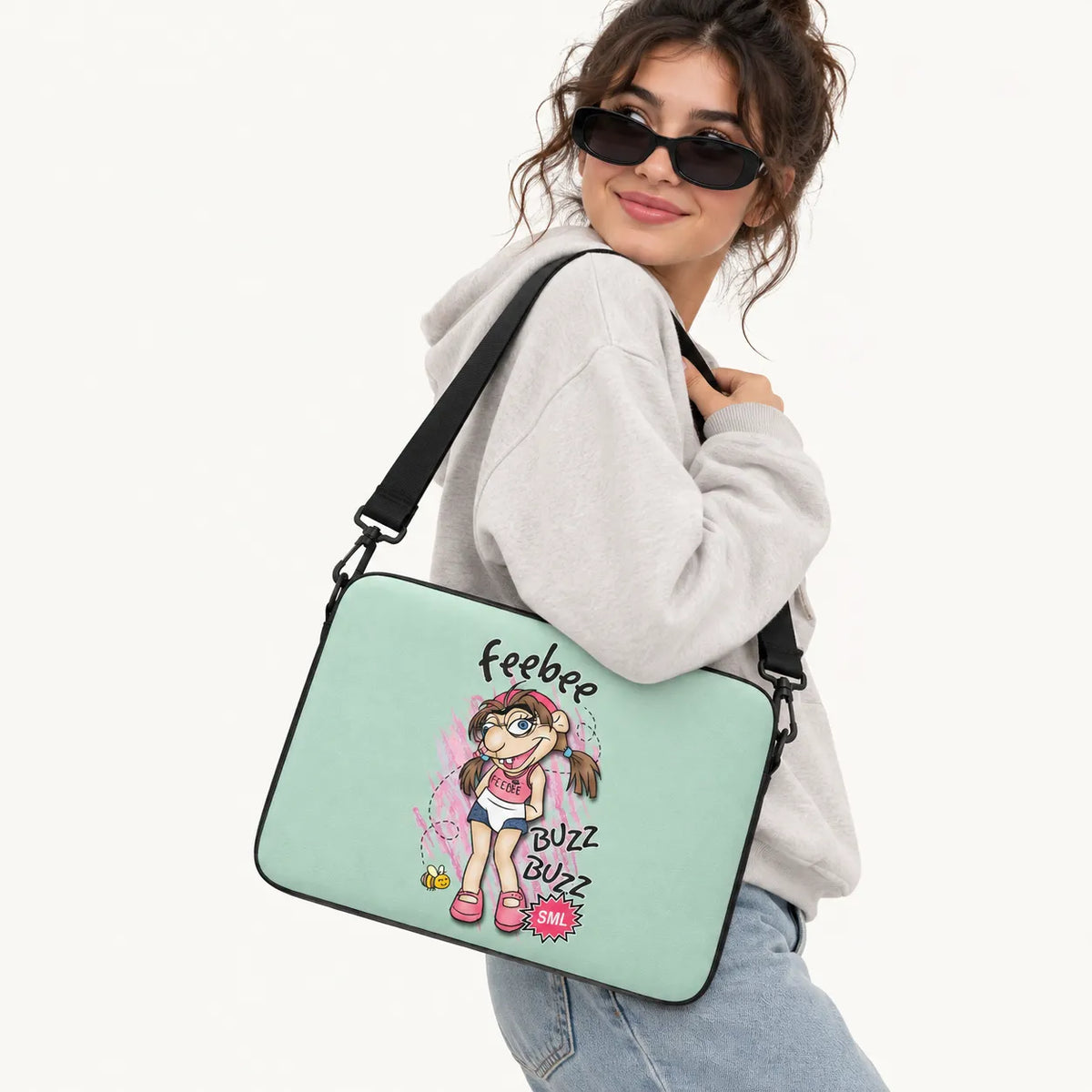 Feebee SML character illustration with bee and buzz buzz text on light mint green padded laptop sleeve by SLEEVER